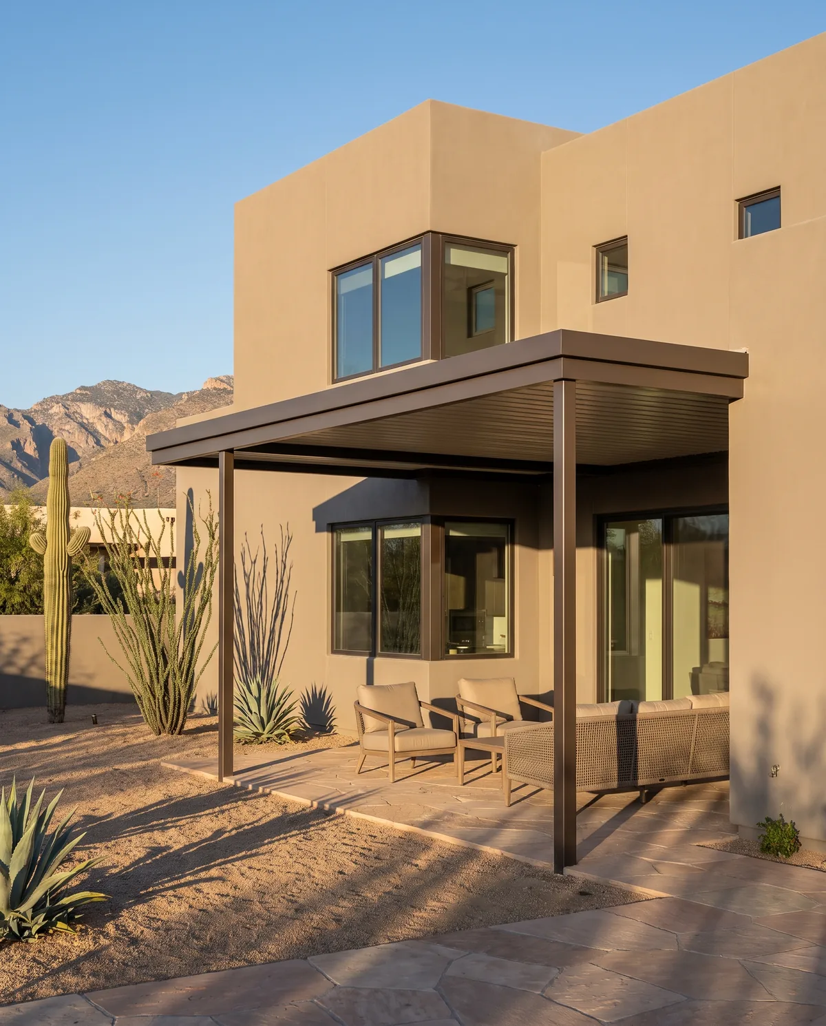 Desert-modern Tucson home with a clean aluminum patio cover over the back patio